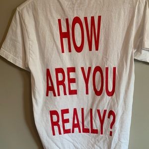 “How are you really?) | We’re Not Really Strangers T-Shirt